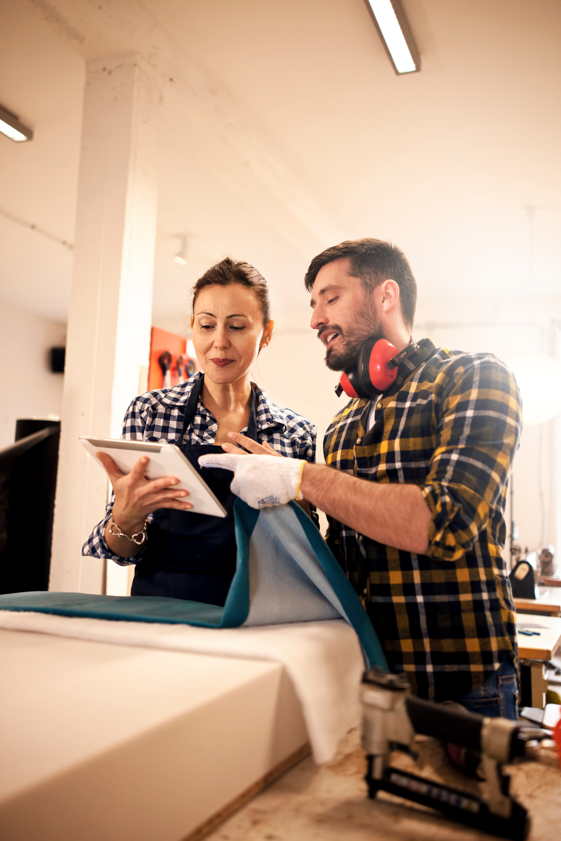 Couple in a construction workshop